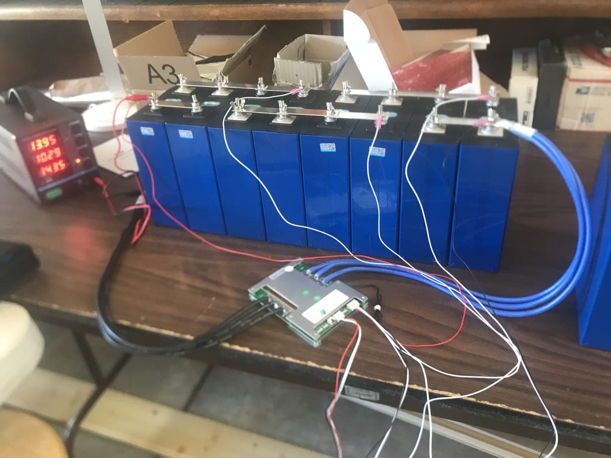 Lithium battery bank cell testing and BMS programming at workbench