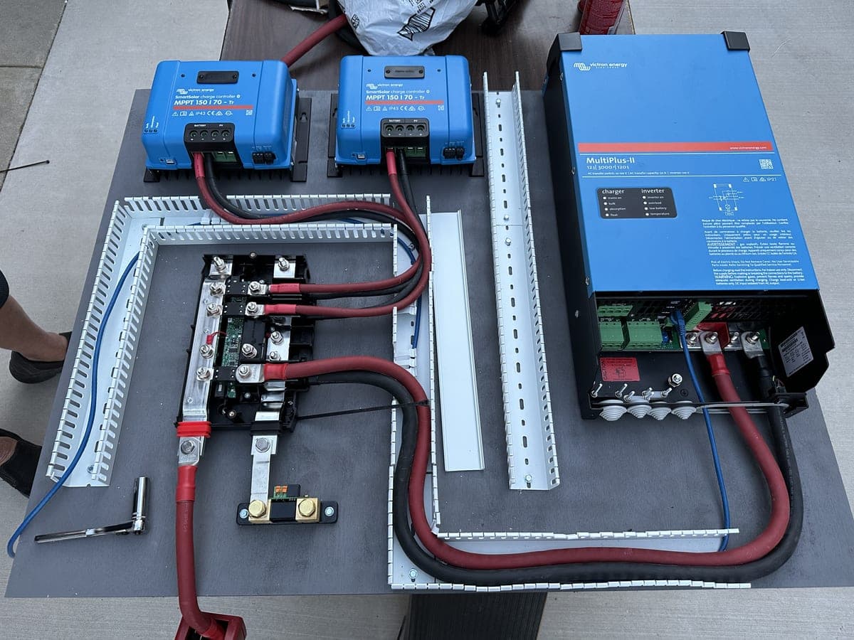 Victron MultiPlus II and MPPTs with Victron power distribution, part of full 2kW solar + 30kWh custom lithium battery bank system in Class A motorcoach