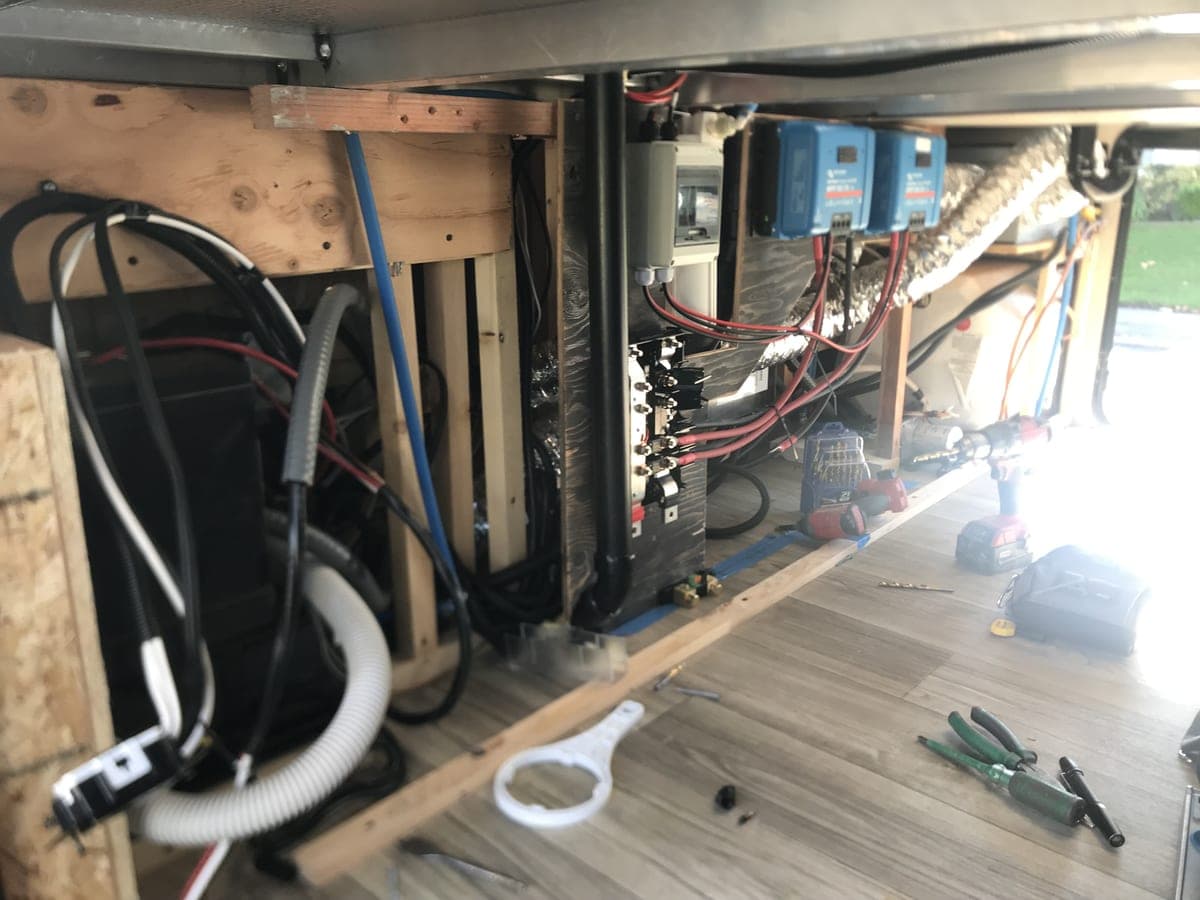 Full RV electrical bay with Victron MultiPlus inverter and lithium bank