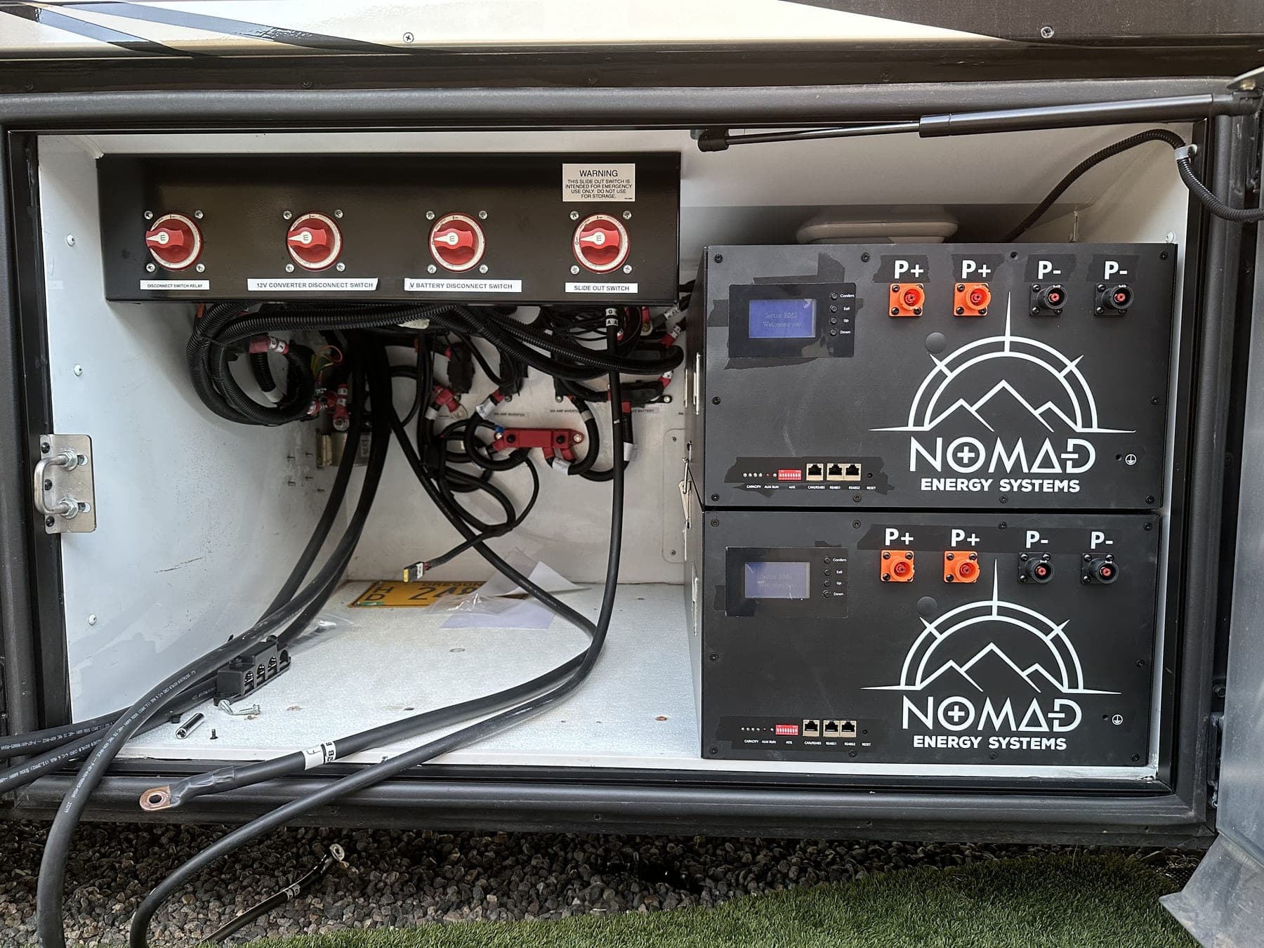 Nomad Energy Systems lithium battery bank installed in customer rig, branding visible